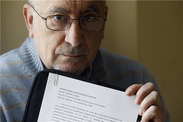 Paco con informe 1.jpg